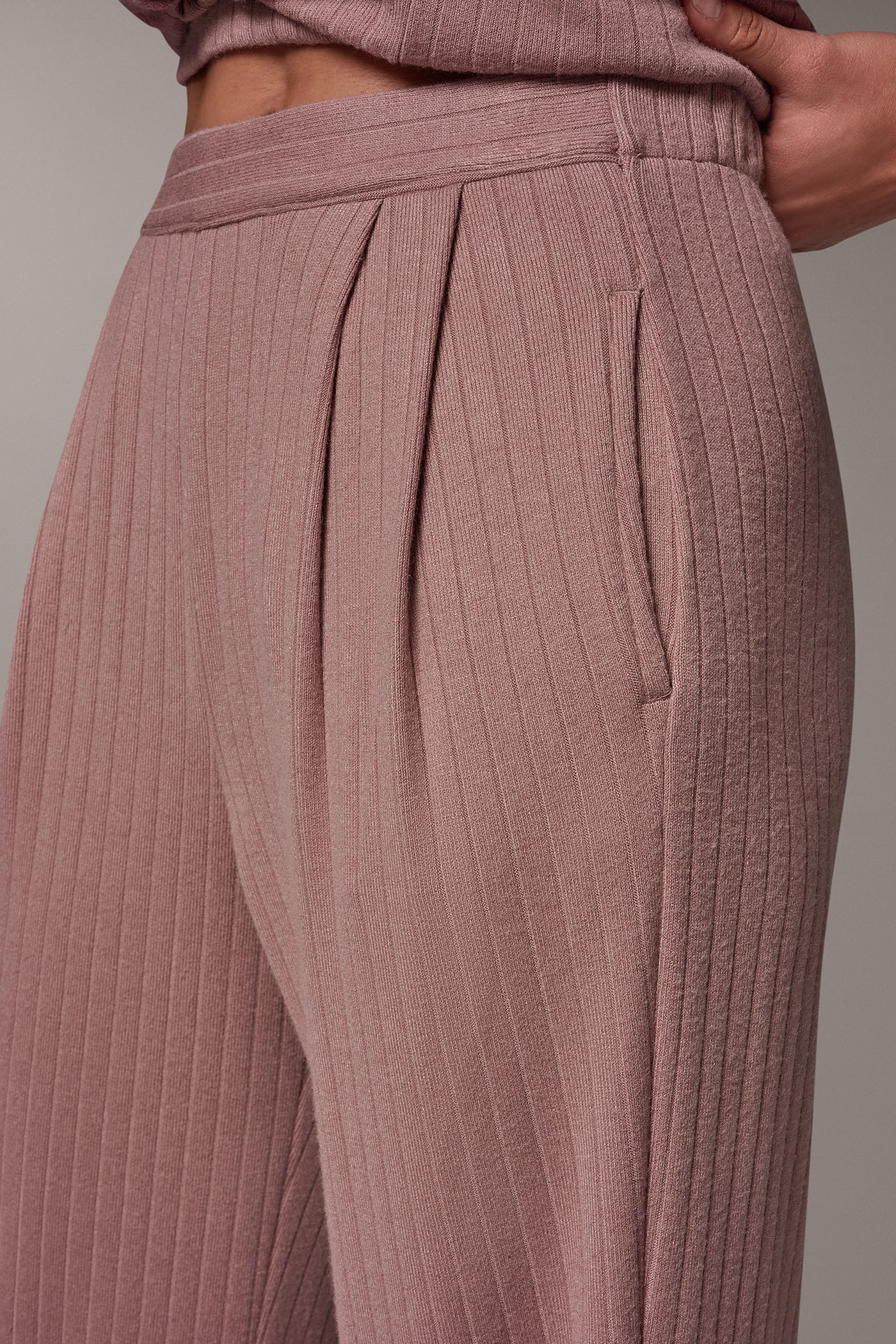Dusty rose ribbed wide leg pants with front pleats and side pockets