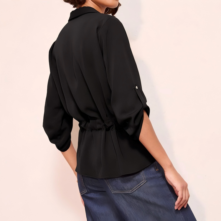 Black polyester zip front utility blouse with roll-tab sleeves chest flaps and self-fabric waist tie
