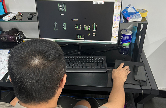 Once the design is finalized, the next step is pattern making. The paper patterns and sample garments are made by experienced pattern makers. The sample garment can be modified as required to ensure that the pattern, size and fabric effect are as per the requirements, which reduces the risks in bulk production. Being a professional garment manufacturer, this is a vital step.