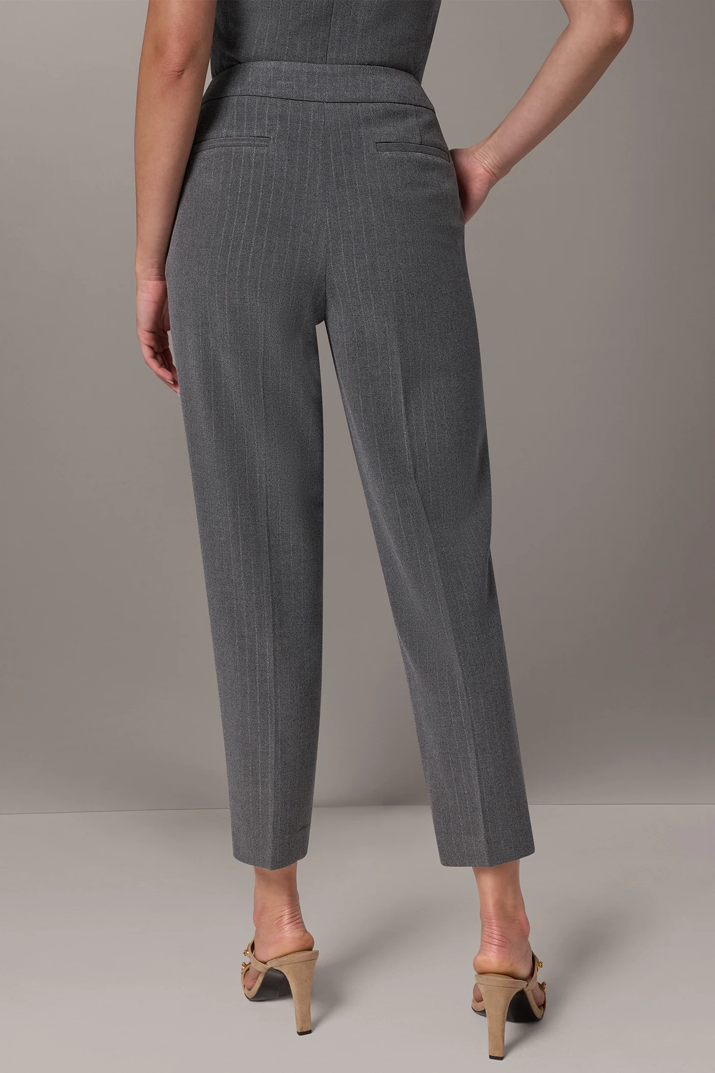 Grey high waist pinstripe trousers with slim ankle length legs